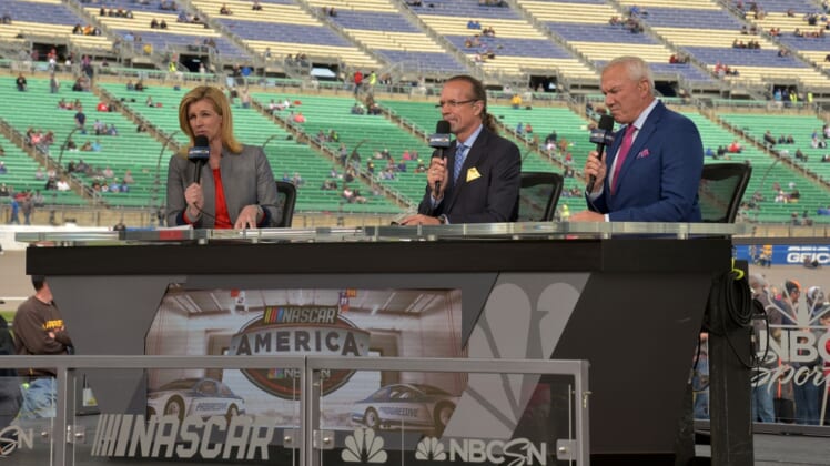 Oct 22, 2017; Kansas City, KS, USA; The NBC announcer crew speak prior to the Hollywood Casino 400 at Kansas Speedway. Mandatory Credit: Denny Medley-USA TODAY Sports
