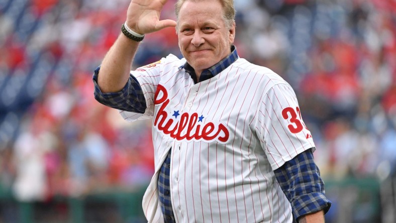 Jun 10, 2018; Philadelphia, PA, USA; Former Philadelphia Phillies pitcher Curt Schilling (38) acknowledges the crowd during pregame ceremony honoring the 1993 National League East Champions before game against the Milwaukee Brewers at Citizens Bank Park. Mandatory Credit: Eric Hartline-USA TODAY Sports