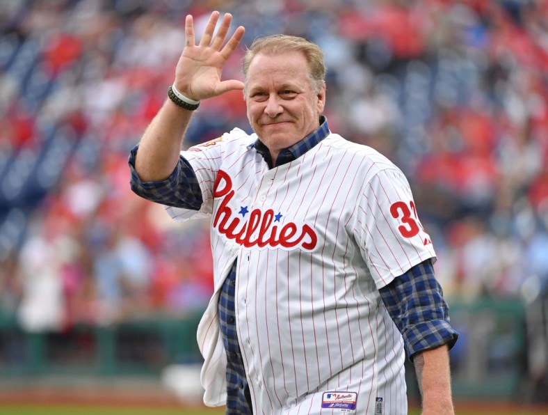 Jun 10, 2018; Philadelphia, PA, USA; Former Philadelphia Phillies pitcher Curt Schilling (38) acknowledges the crowd during pregame ceremony honoring the 1993 National League East Champions before game against the Milwaukee Brewers at Citizens Bank Park. Mandatory Credit: Eric Hartline-USA TODAY Sports