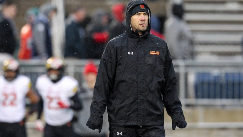 Nov 24, 2018; University Park, PA, USA; Maryland Terrapins interim head coach Matt Canada stands on the field during warm ups before a game against the Penn State Nittany Lions at Beaver Stadium. Mandatory Credit: Matthew O'Haren-USA TODAY Sports