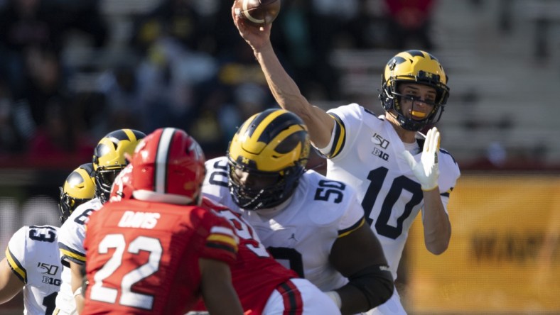 Nov 2, 2019; College Park, MD, USA;  Michigan Wolverines quarterback Dylan McCaffrey (10) throws during the fourth quarter against the Maryland Terrapins at Capital One Field at Maryland Stadium. Mandatory Credit: Tommy Gilligan-USA TODAY Sports