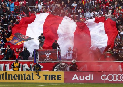 Mar 1, 2020; Harrison, New Jersey, USA;  New York Red Bulls fans celebrate after a goal against FC Cincinnati during the first half at Red Bull Arena. Mandatory Credit: Noah K. Murray-USA TODAY Sports