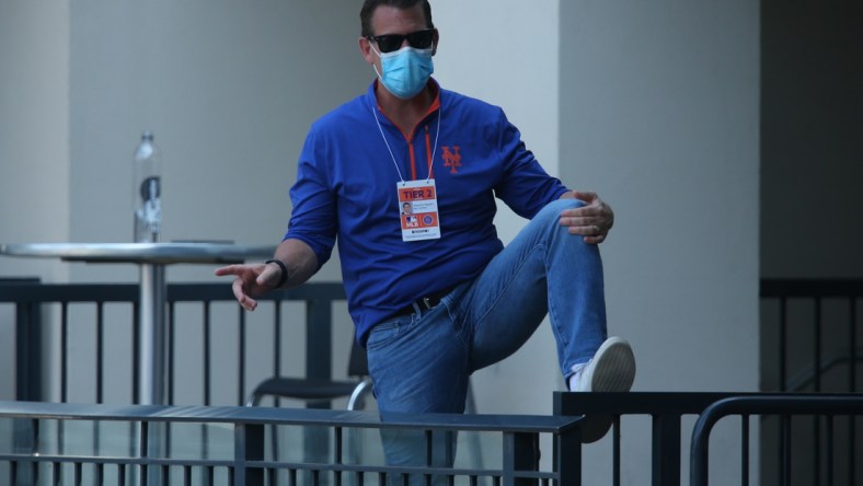 Jul 6, 2020; Flushing Meadows, New York, United States; New York Mets general manager Brodie Van Wagenen watches practice during workouts at Citi Field. Mandatory Credit: Brad Penner-USA TODAY Sports