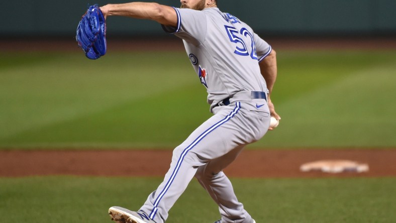 Aug 8, 2020; Boston, Massachusetts, USA;  Toronto Blue Jays relief pitcher Anthony Bass (52) pitches during the ninth inning against the Boston Red Sox at Fenway Park. Mandatory Credit: Bob DeChiara-USA TODAY Sports