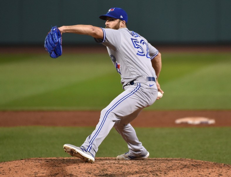 Aug 8, 2020; Boston, Massachusetts, USA;  Toronto Blue Jays relief pitcher Anthony Bass (52) pitches during the ninth inning against the Boston Red Sox at Fenway Park. Mandatory Credit: Bob DeChiara-USA TODAY Sports