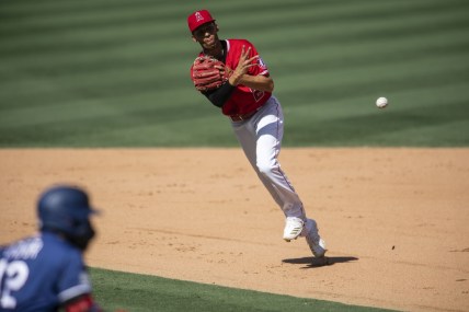Sep 20, 2020; Anaheim, California, USA; Los Angeles Angels shortstop Andrelton Simmons (2) throws the baseball against the Texas Rangers during the game at Angel Stadium. Mandatory Credit: Angels Baseball/Pool Photo via USA TODAY Network