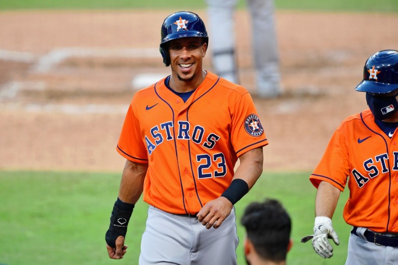 Oct 16, 2020; San Diego, California, USA; Houston Astros designated hitter Michael Brantley (23) reacts after scoring against the Tampa Bay Rays on an sacrifice fly hit by right fielder Kyle Tucker (not pictured) during the seventh inning during game six of the 2020 ALCS at Petco Park. The Houston Astros won 7-4. Mandatory Credit: Jayne Kamin-Oncea-USA TODAY Sports