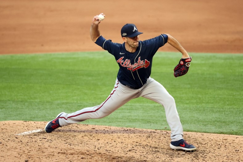 Oct 17, 2020; Arlington, Texas, USA; Atlanta Braves relief pitcher Darren O'Day (56) throws the ball during the seventh inning against the Los Angeles Dodgers during game six of the 2020 NLCS at Globe Life Field. Mandatory Credit: Kevin Jairaj-USA TODAY Sports