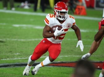 Nov 29, 2020; Tampa, Florida, USA; Kansas City Chiefs running back Clyde Edwards-Helaire (25) runs the ball against the Tampa Bay Buccaneers during the second half at Raymond James Stadium. Mandatory Credit: Kim Klement-USA TODAY Sports