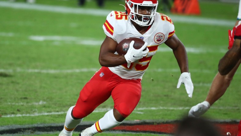 Nov 29, 2020; Tampa, Florida, USA; Kansas City Chiefs running back Clyde Edwards-Helaire (25) runs the ball against the Tampa Bay Buccaneers during the second half at Raymond James Stadium. Mandatory Credit: Kim Klement-USA TODAY Sports