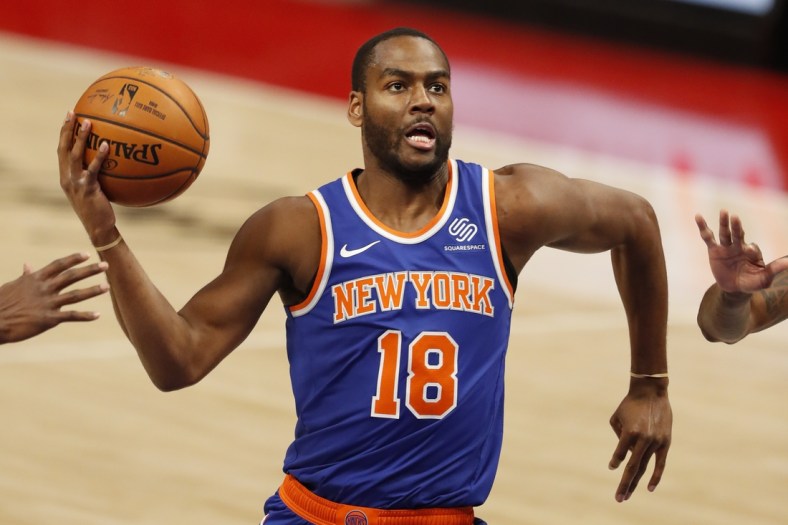 Dec 13, 2020; Detroit, Michigan, USA; New York Knicks guard Alec Burks (18) goes up for a shot during the first quarter against the Detroit Pistons at Little Caesars Arena. Mandatory Credit: Raj Mehta-USA TODAY Sports