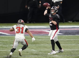 Dec 20, 2020; Atlanta, Georgia, USA; Atlanta Falcons quarterback Matt Ryan (2) throws a pass against Tampa Bay Buccaneers strong safety Antoine Winfield Jr. (31) in the first half of a NFL game at Mercedes-Benz Stadium. Mandatory Credit: Dale Zanine-USA TODAY Sports