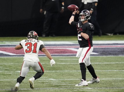 Dec 20, 2020; Atlanta, Georgia, USA; Atlanta Falcons quarterback Matt Ryan (2) throws a pass against Tampa Bay Buccaneers strong safety Antoine Winfield Jr. (31) in the first half of a NFL game at Mercedes-Benz Stadium. Mandatory Credit: Dale Zanine-USA TODAY Sports