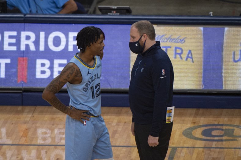 Dec 23, 2020; Memphis, Tennessee, USA;  Memphis Grizzlies guard Ja Morant (12) and Memphis Grizzlies head coach Taylor Jenkins during the second half at FedExForum. Mandatory Credit: Justin Ford-USA TODAY Sports