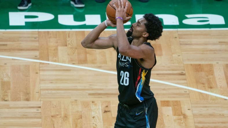 Dec 25, 2020; Boston, Massachusetts, USA; Brooklyn Nets point guard Spencer Dinwiddie (26) shoots a free throw during the third quarter against the Boston Celtics at TD Garden. Mandatory Credit: Gregory Fisher-USA TODAY Sports