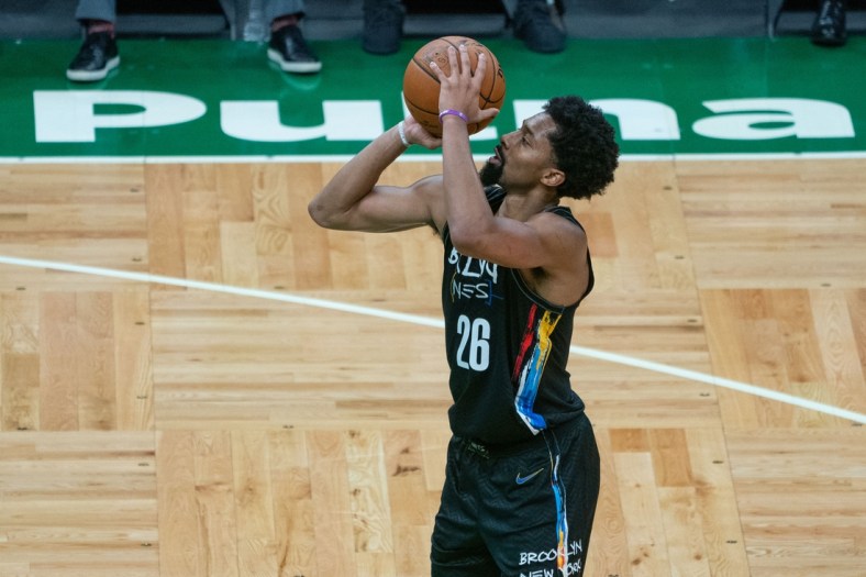 Dec 25, 2020; Boston, Massachusetts, USA; Brooklyn Nets point guard Spencer Dinwiddie (26) shoots a free throw during the third quarter against the Boston Celtics at TD Garden. Mandatory Credit: Gregory Fisher-USA TODAY Sports