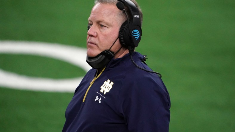 Jan 1, 2021; Arlington, TX, USA; Notre Dame Fighting Irish head coach Brian Kelly looks on in the fourth quarter against the Alabama Crimson Tide during the Rose Bowl at AT&T Stadium. Mandatory Credit: Kirby Lee-USA TODAY Sports