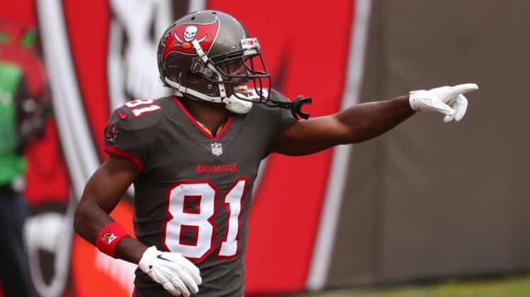Jan 3, 2021; Tampa, Florida, USA; Tampa Bay Buccaneers wide receiver Antonio Brown (81) celebrates after scoring a touchdown against the Atlanta Falcons during the second quarter at Raymond James Stadium. Mandatory Credit: Kim Klement-USA TODAY Sports