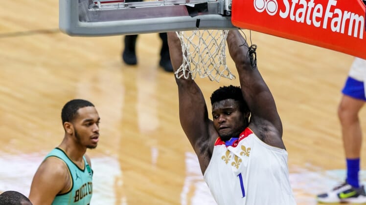 Jan 8, 2021; New Orleans, Louisiana, USA;  New Orleans Pelicans forward Zion Williamson (1) dunks the ball against Charlotte Hornets during the third quarter at Smoothie King Center. Mandatory Credit: Stephen Lew-USA TODAY Sports