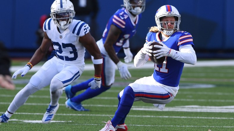 Jan 9, 2021; Orchard Park, New York, USA; Buffalo Bills wide receiver Cole Beasley (11) runs the ball against the Indianapolis Colts during the first half in the AFC Wild Card game at Bills Stadium. Mandatory Credit: Rich Barnes-USA TODAY Sports