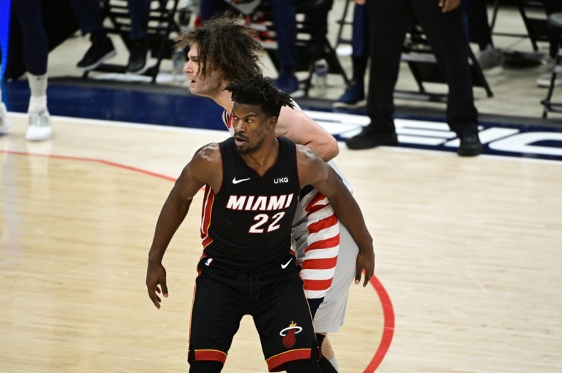 Jan 9, 2021; Washington, District of Columbia, USA;  Miami Heat forward Jimmy Butler (22) guards Washington Wizards center Robin Lopez (15) during the first half at Capital One Arena. Mandatory Credit: Tommy Gilligan-USA TODAY Sports