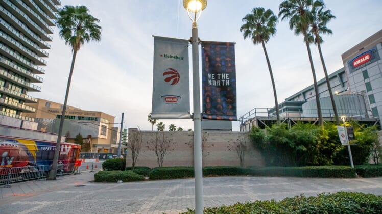 Jan 14, 2021; Tampa, Florida, USA;  A general view of the exterior of Amalie Arena as a Tampa Streetcar outfitted with Super Bowl LV advertising drives by before a game between the Toronto Raptors and Charlotte Hornets at Amalie Arena. Mandatory Credit: Mary Holt-USA TODAY Sports