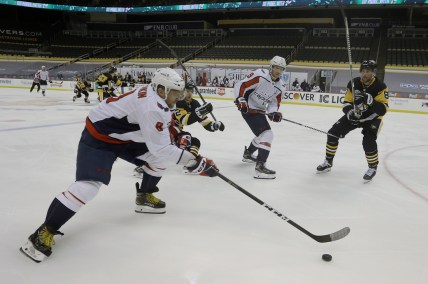 Jan 17, 2021; Pittsburgh, Pennsylvania, USA;  Washington Capitals left wing Alex Ovechkin (8) carries the puck against the Pittsburgh Penguins during the second period at the PPG Paints Arena. Mandatory Credit: Charles LeClaire-USA TODAY Sports