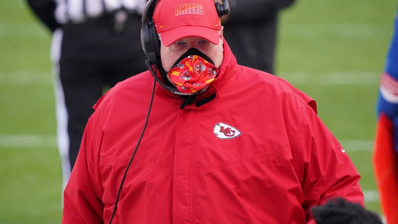 Jan 17, 2021; Kansas City, Missouri, USA; Kansas City Chiefs head coach Andy Reid speaks to players during the first half in the AFC Divisional Round playoff game at Arrowhead Stadium. Mandatory Credit: Denny Medley-USA TODAY Sports