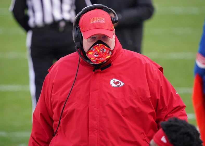 Jan 17, 2021; Kansas City, Missouri, USA; Kansas City Chiefs head coach Andy Reid speaks to players during the first half in the AFC Divisional Round playoff game at Arrowhead Stadium. Mandatory Credit: Denny Medley-USA TODAY Sports