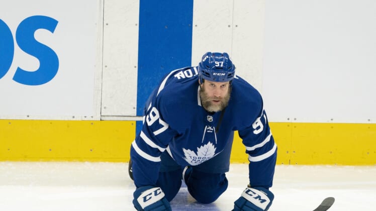 Jan 18, 2021; Toronto, Ontario, CAN; Toronto Maple Leafs center Joe Thornton (97) stretches during the warm-up against the Winnipeg Jets at Scotiabank Arena. Mandatory Credit: Nick Turchiaro-USA TODAY Sports