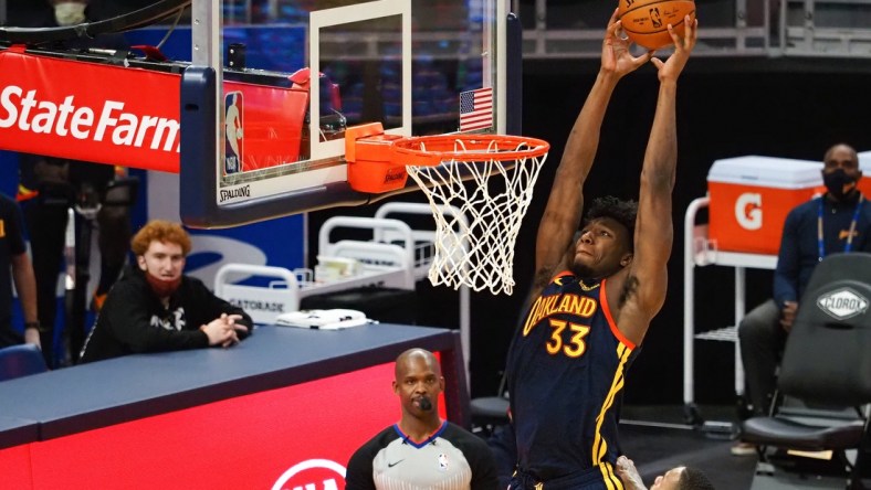 Jan 20, 2021; San Francisco, California, USA; Golden State Warriors center James Wiseman (33) goes up for a dunk against the San Antonio Spurs during the third quarter at Chase Center. Mandatory Credit: Kelley L Cox-USA TODAY Sports