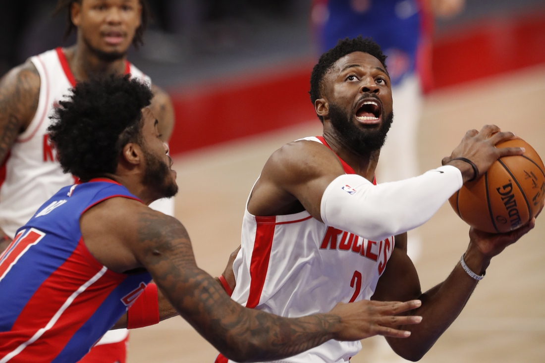 Jan 22, 2021; Detroit, Michigan, USA; Houston Rockets guard David Nwaba (2) goes up for a shot against Detroit Pistons forward Saddiq Bey (41) during the second quarter at Little Caesars Arena. Mandatory Credit: Raj Mehta-USA TODAY Sports