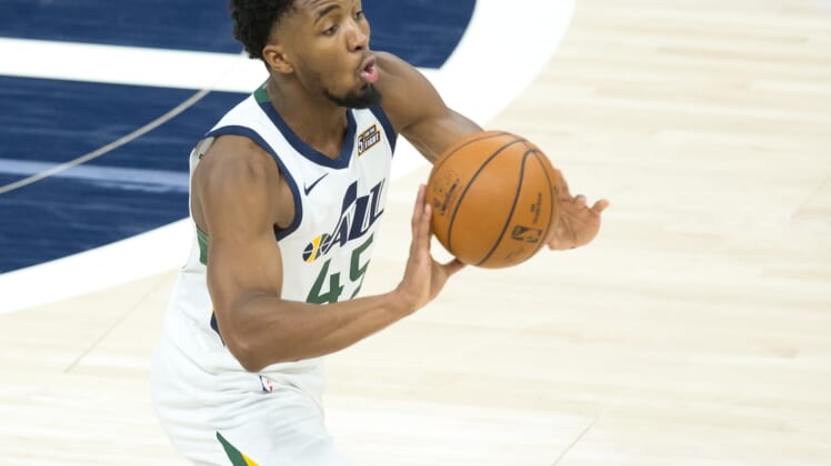 Jan 23, 2021; Salt Lake City, Utah, USA; Utah Jazz guard Donovan Mitchell (45) passes the ball during the first half against the Golden State Warriors at Vivint Smart Home Arena. Mandatory Credit: Russell Isabella-USA TODAY Sports