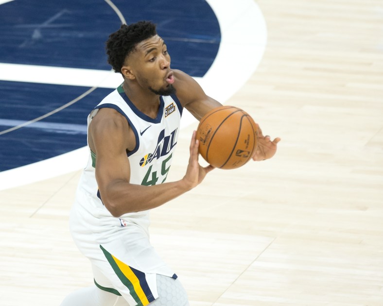 Jan 23, 2021; Salt Lake City, Utah, USA; Utah Jazz guard Donovan Mitchell (45) passes the ball during the first half against the Golden State Warriors at Vivint Smart Home Arena. Mandatory Credit: Russell Isabella-USA TODAY Sports