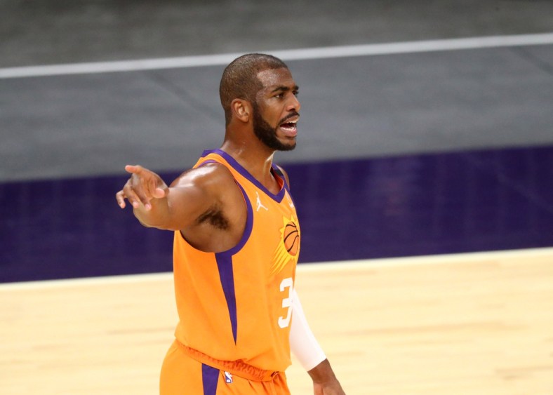 Jan 22, 2021; Phoenix, Arizona, USA; Phoenix Suns guard Chris Paul (3) reacts against the Denver Nuggets at Phoenix Suns Arena. Mandatory Credit: Mark J. Rebilas-USA TODAY Sports
