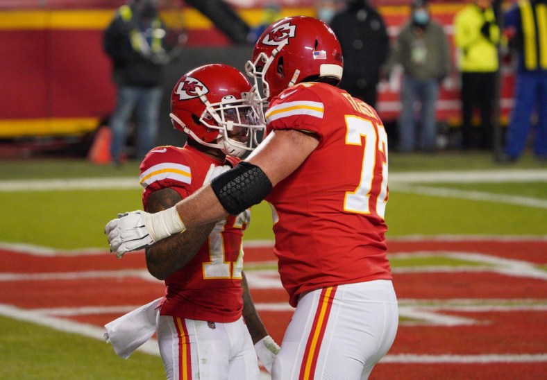 Jan 24, 2021; Kansas City, MO, USA; Kansas City Chiefs wide receiver Mecole Hardman (17) celebrates with offensive tackle Eric Fisher (72) after scoring a touchdown against the Buffalo Bills during the second quarter in the AFC Championship Game at Arrowhead Stadium. Mandatory Credit: Denny Medley-USA TODAY Sports
