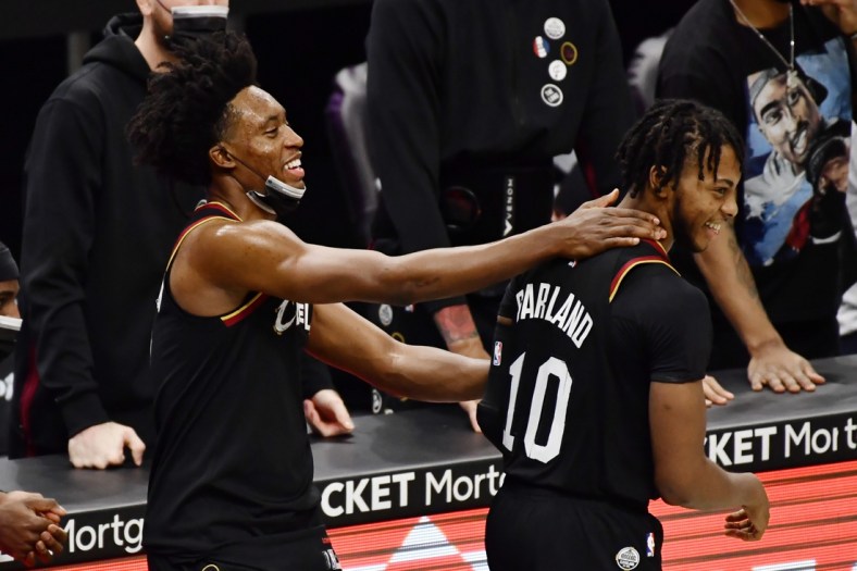 Jan 27, 2021; Cleveland, Ohio, USA; Cleveland Cavaliers guard Collin Sexton (2) and guard Darius Garland (10) celebrate during the fourth quarter against the Detroit Pistons at Rocket Mortgage FieldHouse. Mandatory Credit: Ken Blaze-USA TODAY Sports