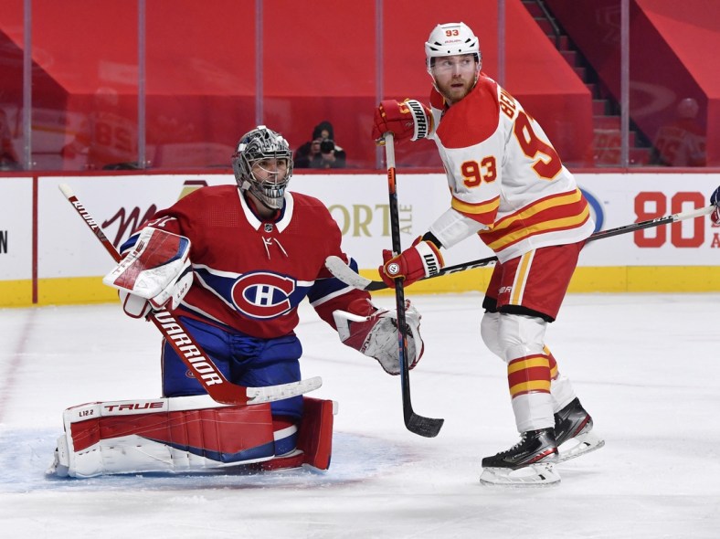 Jan 28, 2021; Montreal, Quebec, CAN; Calgary Flames forward Sam Bennett (93) screens Montreal Canadiens goalie Carey Price (31) during the third period at the Bell Centre. Mandatory Credit: Eric Bolte-USA TODAY Sports