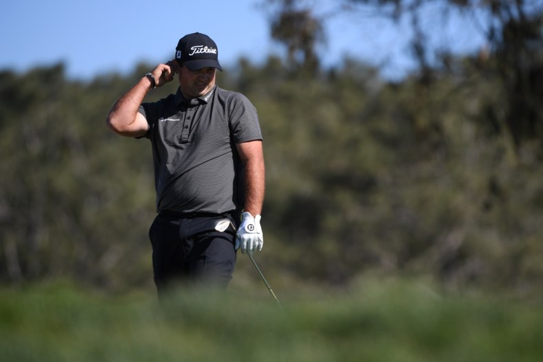 Jan 30, 2021; San Diego, California, USA; Patrick Reed reacts after a shot on the 12th green during the third round of the Farmers Insurance Open golf tournament at Torrey Pines Municipal Golf Course - South Course. Mandatory Credit: Orlando Ramirez-USA TODAY Sports