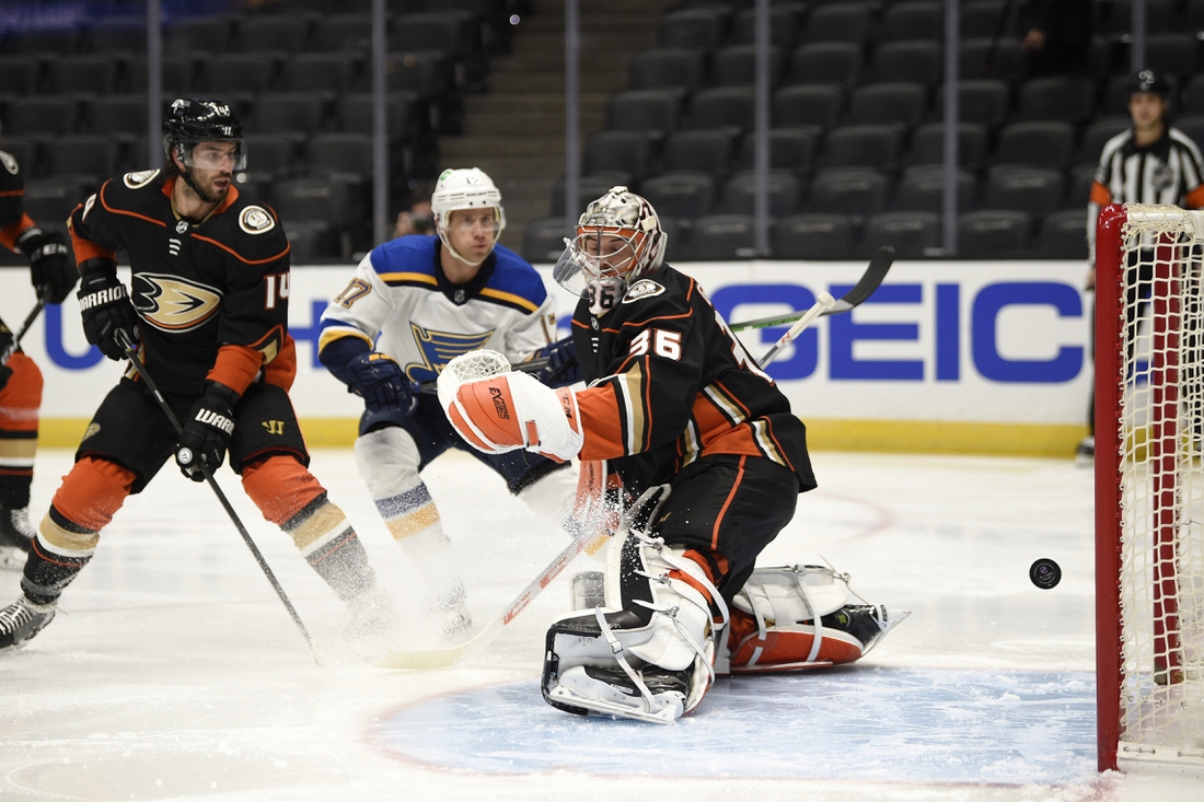 Jan 30, 2021; Anaheim, California, USA; Anaheim Ducks goalie John Gibson (36) is unable to stop a shot for a goal by St. Louis Blues center Jordan Kyrou (25) during the first period at Honda Center. Mandatory Credit: Kelvin Kuo-USA TODAY Sports