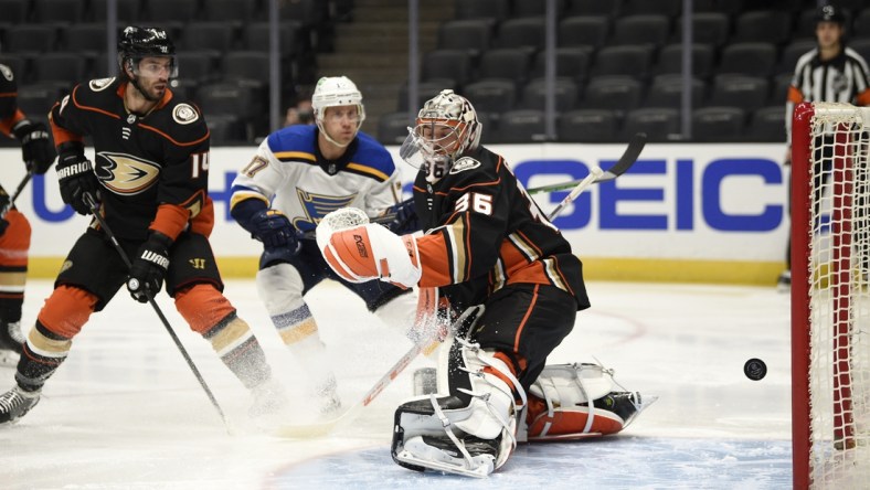 Jan 30, 2021; Anaheim, California, USA; Anaheim Ducks goalie John Gibson (36) is unable to stop a shot for a goal by St. Louis Blues center Jordan Kyrou (25) during the first period at Honda Center. Mandatory Credit: Kelvin Kuo-USA TODAY Sports