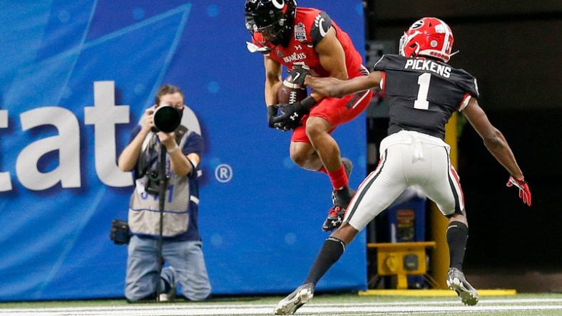 Twitter slams College Football Playoff committee as Cincinnati Bearcats lose 2021 Peach Bowl