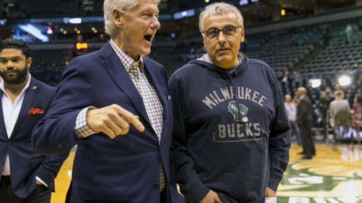 Apr 26, 2018; Milwaukee, WI, USA; United States former President Bill Clinton talks with Milwaukee Bucks owner Marc Lasry prior to game six in the first round of the 2018 NBA Playoffs against the Boston Celtics at BMO Harris Bradley Center. Mandatory Credit: Jeff Hanisch-USA TODAY Sports