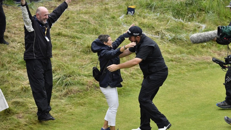 Jul 21, 2019; Portrush, IRL; Shane Lowry celebrates with his mother after winning The Open Championship golf tournament during the final round at Royal Portrush Golf Club -  Dunluce Course. Mandatory Credit: Steve Flynn-USA TODAY Sports