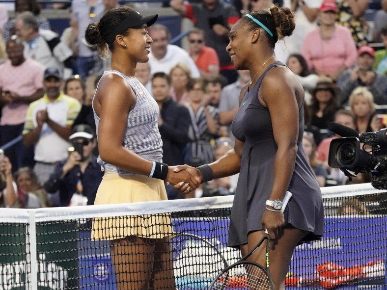 Aug 9, 2019; Toronto, Ontario, Canada; Naomi Osaka (left) congratulates Serena Williams (right) on her win during the Rogers Cup tennis tournament at Aviva Centre. Mandatory Credit: John E. Sokolowski-USA TODAY Sports
