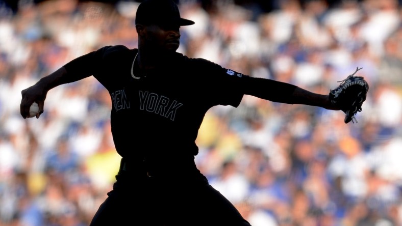 August 25, 2019; Los Angeles, CA, USA; New York Yankees starting pitcher Domingo German (55) throws against the Los Angeles Dodgers during the sixth inning in an MLB Players' Weekend game at Dodger Stadium. Mandatory Credit: Gary A. Vasquez-USA TODAY Sports