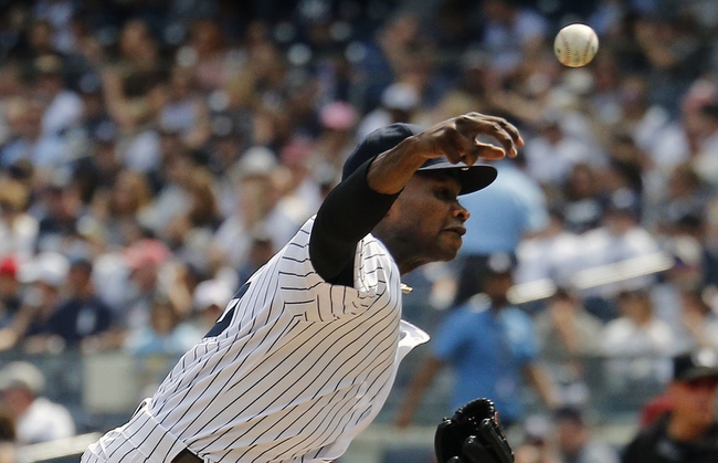 Aug 31, 2019; Bronx, NY, USA; New York Yankees starting pitcher Domingo German (55) pitches against the Oakland Athletics during the first inning at Yankee Stadium. Mandatory Credit: Andy Marlin-USA TODAY Sports