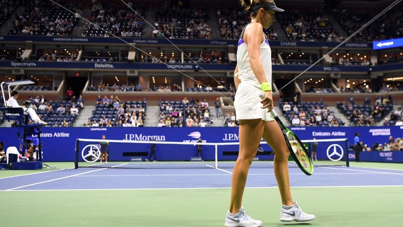 Sep 5, 2019; Flushing, NY, USA; Belinda Bencic of Switzerland walks onto the court to face Bianca Andreescu of Canada in a semifinal match on day eleven of the 2019 US Open tennis tournament at USTA Billie Jean King National Tennis Center. Mandatory Credit: Danielle Parhizkaran-USA TODAY Sports