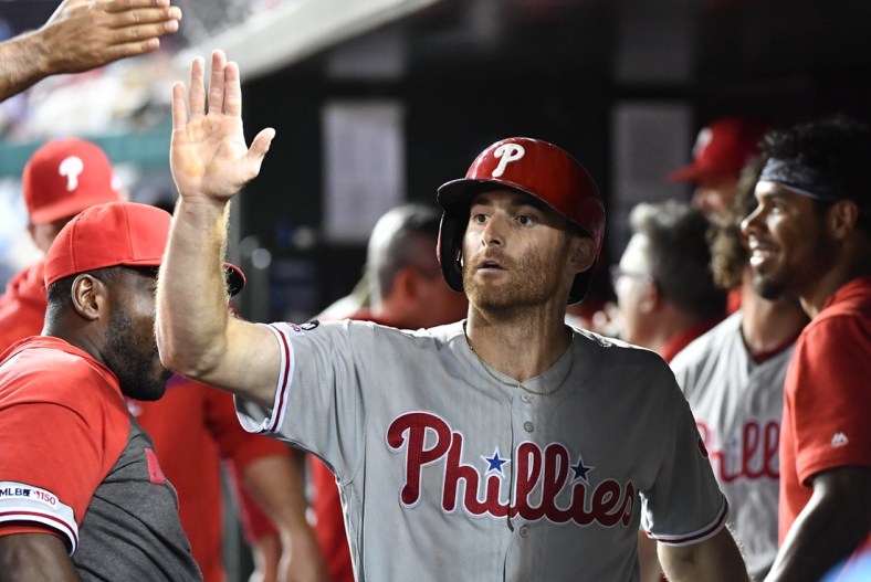 Sep 24, 2019; Washington, DC, USA; Philadelphia Phillies left fielder Brad Miller (33) is congratulated by teammates after hitting a solo home run against the Washington Nationals during the fourth inning at Nationals Park. Mandatory Credit: Brad Mills-USA TODAY Sports