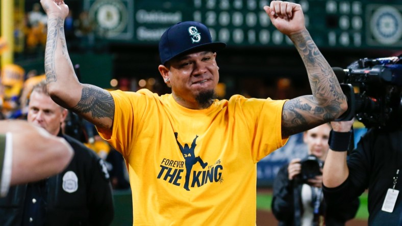 Sep 26, 2019; Seattle, WA, USA; Starting pitcher Felix Hernandez (34) celebrates with fans following a 3-1 loss against the Oakland Athletics at T-Mobile Park. Mandatory Credit: Joe Nicholson-USA TODAY Sports